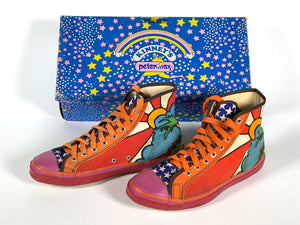 Peter Max sneakers and the box they are sold in. Each are covered in Peter Max art including stars.