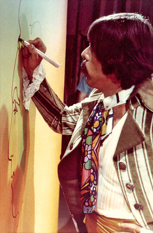 Peter stands and draws a huge profile live on the Ed Sullivan Show.